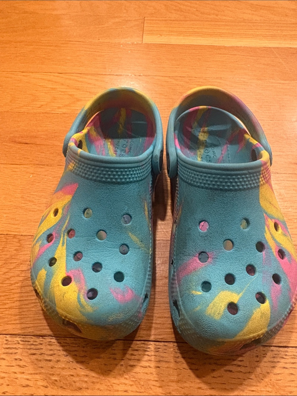 CROCS Kids Clog in Teal with Yellow & Pink Swirl Accents